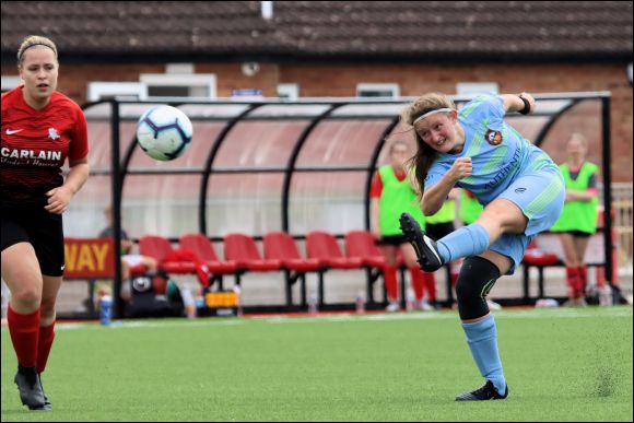 Kate turns and fires home her first ever City goal against Longlevens in August 2021
