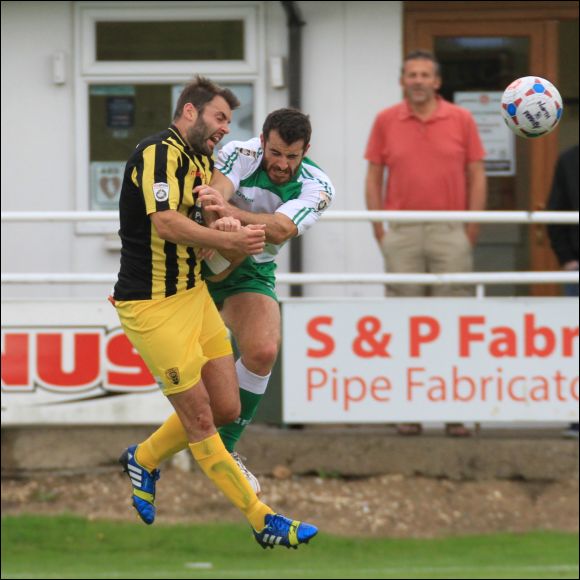 Ferriby player Adam Boulder is red carded for this high challenge