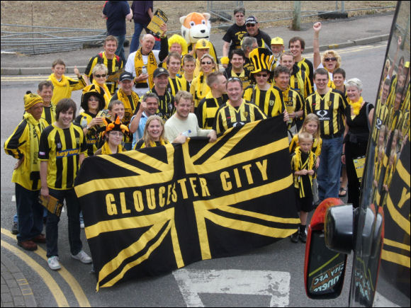 City's fans who proudly led the open top bus through the streets of Gloucester