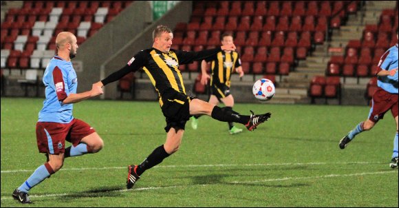 A rueful miss as Darren Edwards lobs the keeper but misses the target