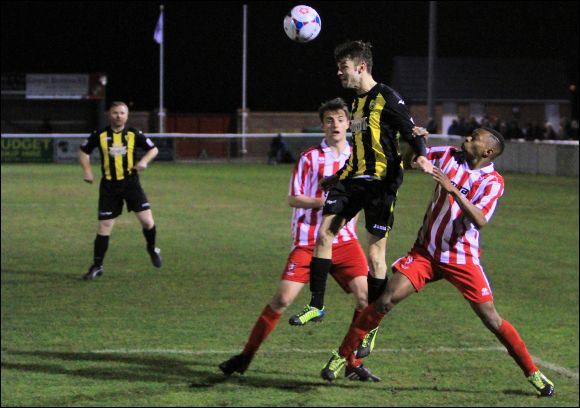 Marcus Giglio wins a header for City at Evesham tonight