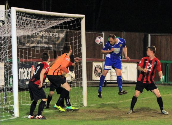 Charlie Griffin heads City's second goal at Histon