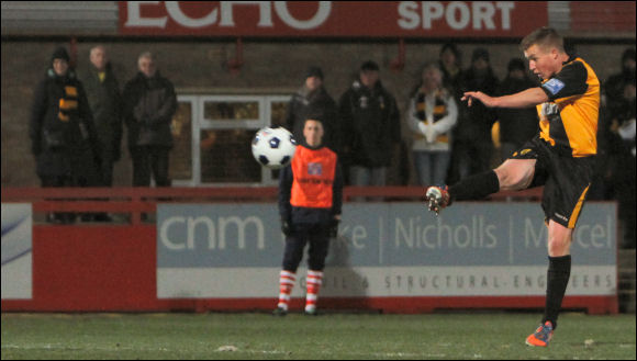 Jordan Goddard tries his luck from distance against Boston