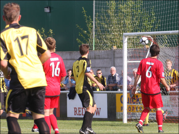 Lee Marshall watches his free kick find the top corner against Droylsden