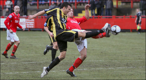 Man of the Match Jack Pitcher stretches for a ball at Workington