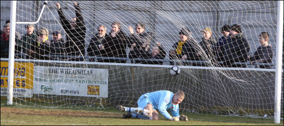 Lee Smith's penalty hits the back of the net and City's fans celebrate